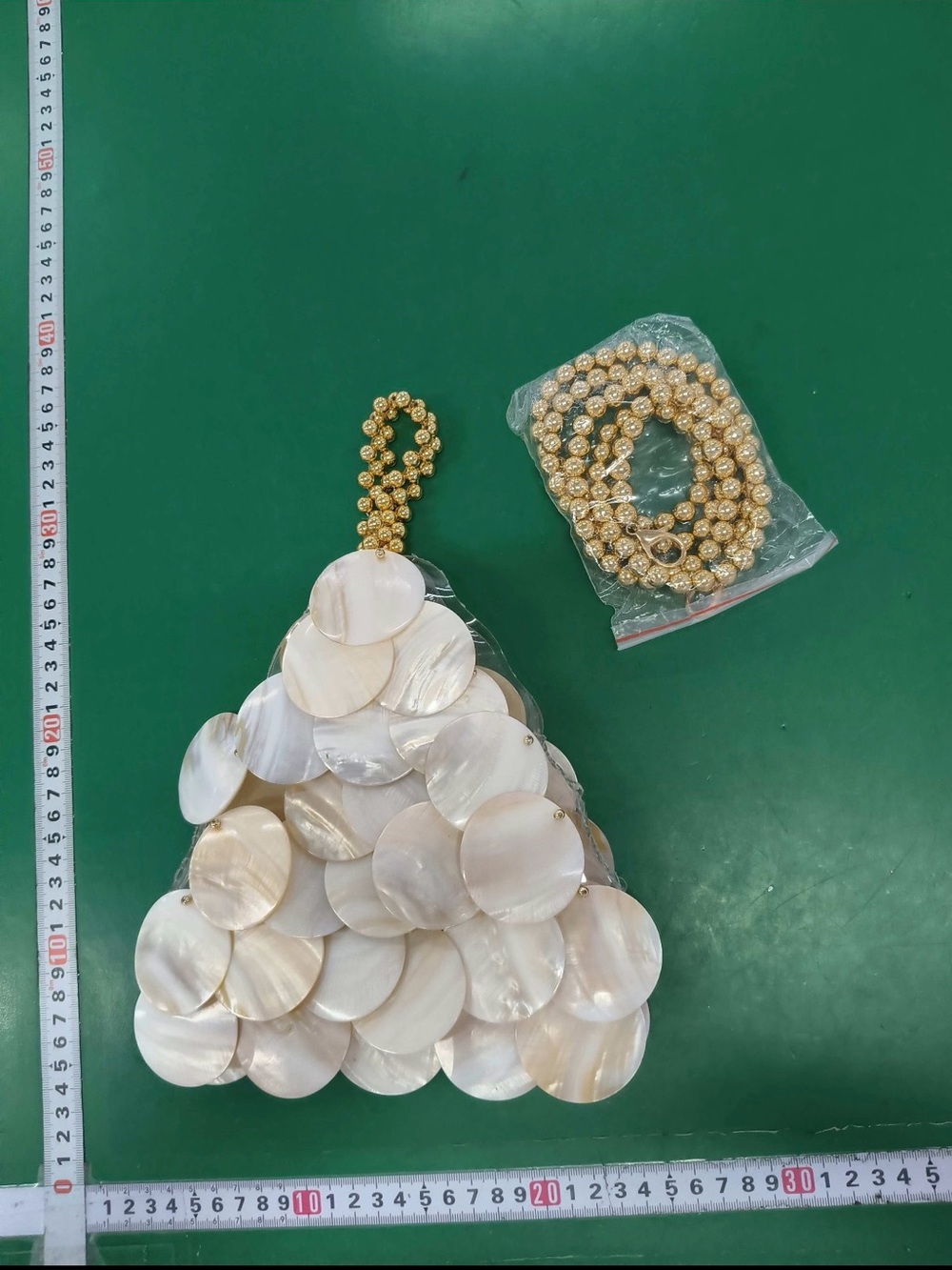 A Classy Chic Boutique Iridescent Pearl Shell Disc Wristlet - Picture 6 of 6